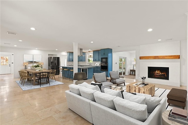 503 Wesley Oak Cir, Saint Simons Island, GA 31522 - living area with a warm lit fireplace and recessed lighting
