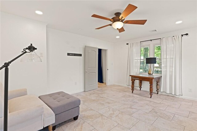 living area with visible vents, a ceiling fan, baseboards, and recessed lighting