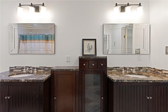 503 Wesley Oak Cir, Saint Simons Island, GA 31522 - bathroom featuring two vanities and curtained shower