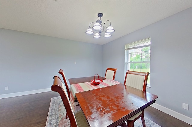 20 Marla St, Hoboken, GA 31542 - dining area featuring baseboards, a chandelier, and dark wood-style flooring