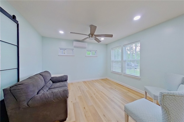 20 Marla St, Hoboken, GA 31542 - sitting room featuring an AC wall unit, a ceiling fan, light wood-style flooring, recessed lighting, and baseboards