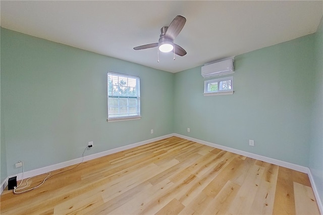 20 Marla St, Hoboken, GA 31542 - spare room featuring a wall mounted AC, healthy amount of natural light, baseboards, and wood finished floors