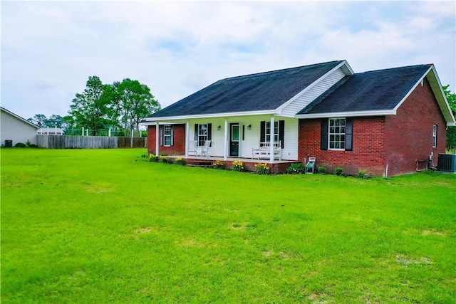 20 Marla St, Hoboken, GA 31542 - view of front of home with a porch, brick siding, central AC, and roof with shingles