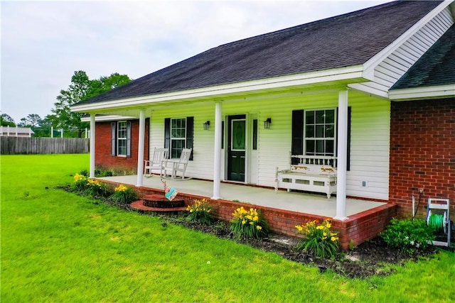 20 Marla St, Hoboken, GA 31542 - view of front facade with a porch, brick siding, and a shingled roof