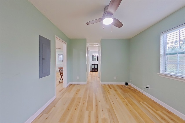 20 Marla St, Hoboken, GA 31542 - spare room featuring light wood-style flooring, plenty of natural light, baseboards, and electric panel