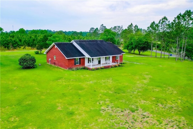 20 Marla St, Hoboken, GA 31542 - back of house with a lawn, a porch, and brick siding