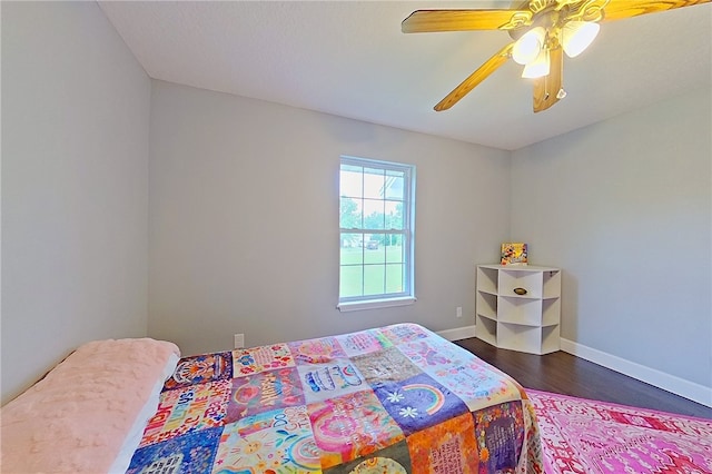 20 Marla St, Hoboken, GA 31542 - bedroom with dark wood finished floors, a ceiling fan, and baseboards