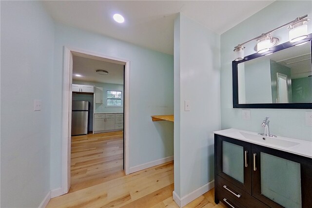 20 Marla St, Hoboken, GA 31542 - bathroom featuring wood finished floors, vanity, and baseboards