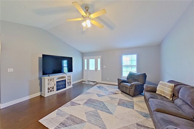 20 Marla St, Hoboken, GA 31542 - living area featuring wood finished floors, lofted ceiling, a ceiling fan, baseboards, and a fireplace