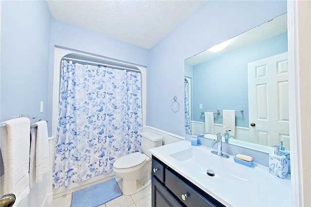20 Marla St, Hoboken, GA 31542 - full bath with a textured ceiling, tile patterned floors, toilet, and vanity