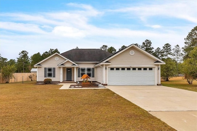 single story home with a garage and a front lawn