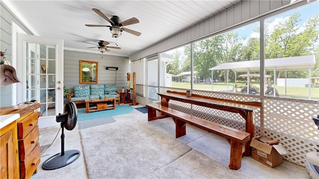 sunroom / solarium with ceiling fan