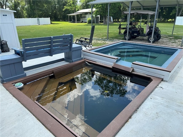 view of pool featuring a yard