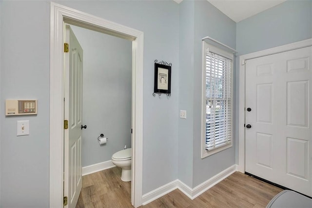 foyer with light hardwood / wood-style floors