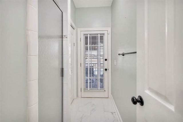 bathroom featuring an enclosed shower