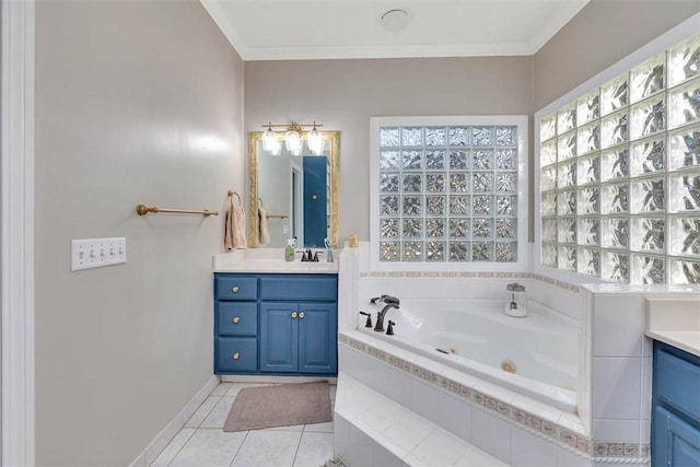 bathroom with crown molding, tiled tub, tile patterned floors, and vanity