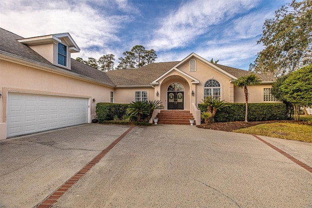 view of front of home featuring a garage