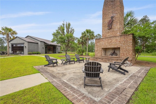 231 Salt Creek Way E, Brunswick, GA 31523 - view of patio / terrace with an outdoor brick fireplace