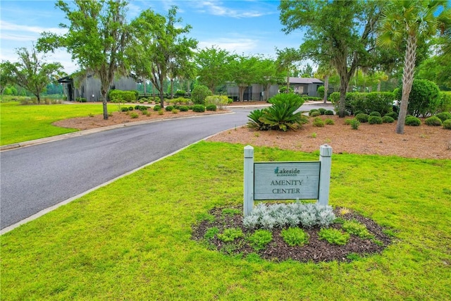 231 Salt Creek Way E, Brunswick, GA 31523 - view of asphalt road with curbs