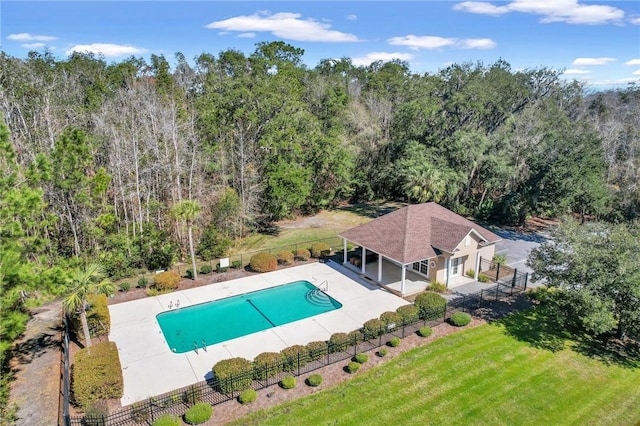 view of swimming pool with a fenced in pool, a lawn, a patio, and fence