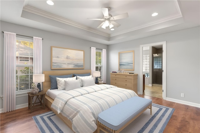 22 Millpond Cir, Brunswick, GA 31525 - bedroom featuring a raised ceiling, ornamental molding, baseboards, and light wood-type flooring