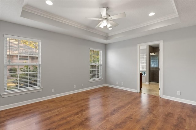 22 Millpond Cir, Brunswick, GA 31525 - spare room with ceiling fan, wood finished floors, a raised ceiling, baseboards, and ornamental molding