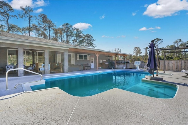 view of swimming pool featuring a patio