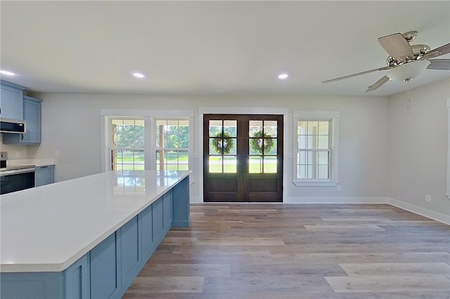 880 Miles Still Rd, Waycross, GA 31503 - foyer entrance featuring french doors, healthy amount of natural light, recessed lighting, light wood-style floors, and baseboards