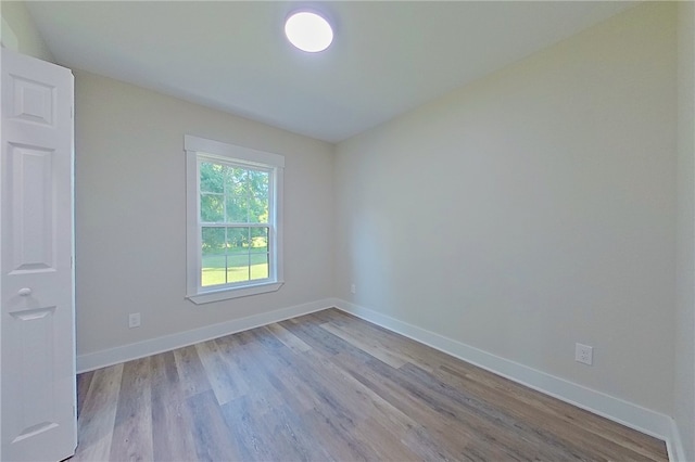 880 Miles Still Rd, Waycross, GA 31503 - spare room with wood finished floors and baseboards