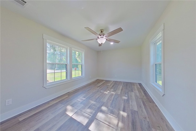 880 Miles Still Rd, Waycross, GA 31503 - unfurnished room featuring a ceiling fan, baseboards, and light wood-type flooring