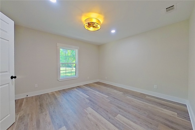 880 Miles Still Rd, Waycross, GA 31503 - empty room with light wood finished floors, recessed lighting, and baseboards