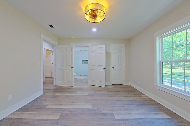 880 Miles Still Rd, Waycross, GA 31503 - unfurnished room featuring baseboards, recessed lighting, and light wood-style floors