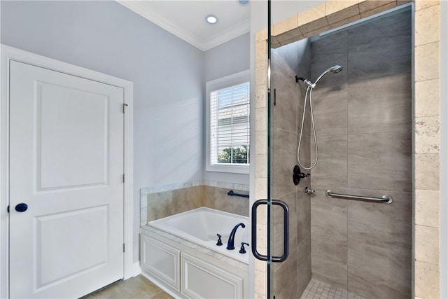 bathroom featuring tile patterned flooring, crown molding, and independent shower and bath