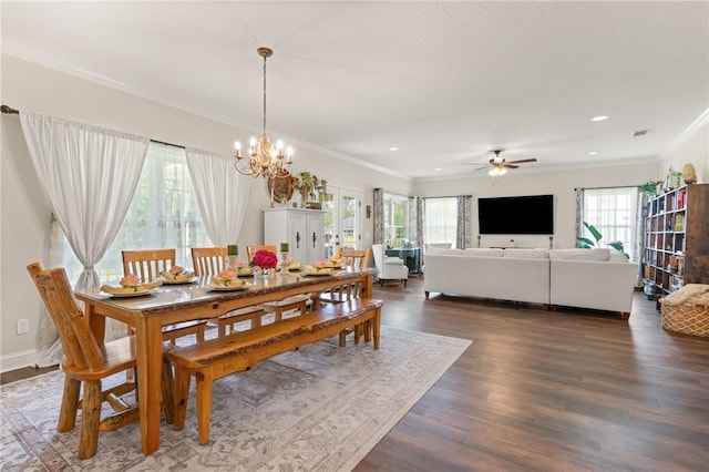 156 Allie Loop, Brunswick, GA 31525 - dining area with crown molding, a chandelier, dark wood-style flooring, a ceiling fan, and recessed lighting
