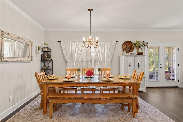 156 Allie Loop, Brunswick, GA 31525 - dining room with a chandelier, ornamental molding, wood finished floors, french doors, and baseboards