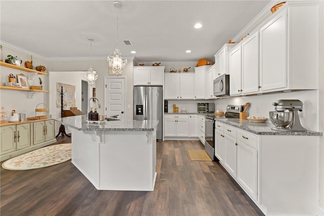 156 Allie Loop, Brunswick, GA 31525 - kitchen with appliances with stainless steel finishes, dark wood-style floors, white cabinets, crown molding, and a sink