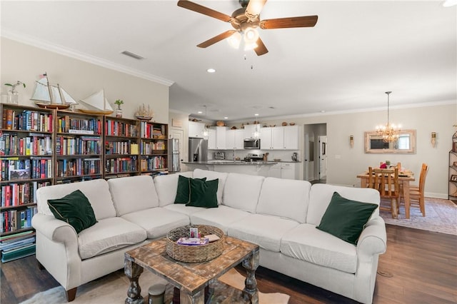 156 Allie Loop, Brunswick, GA 31525 - living room featuring a chandelier, ceiling fan, wood finished floors, crown molding, and recessed lighting