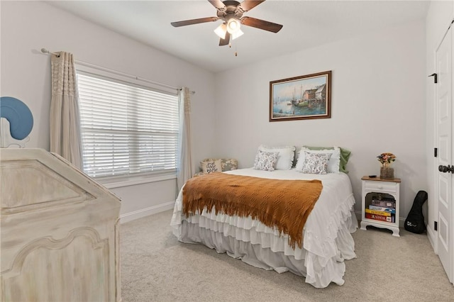 156 Allie Loop, Brunswick, GA 31525 - bedroom with light colored carpet, baseboards, and a ceiling fan