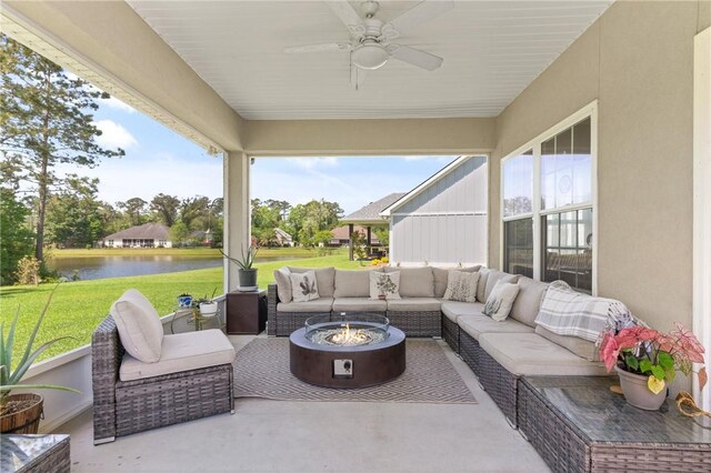 156 Allie Loop, Brunswick, GA 31525 - view of patio / terrace with an outdoor living space with a fire pit, a water view, and a ceiling fan