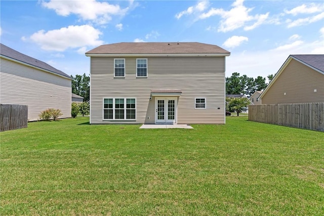 107 Heatherly Way, Brunswick, GA 31523 - rear view of house with french doors and a patio area