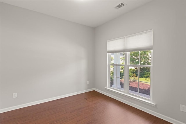 107 Heatherly Way, Brunswick, GA 31523 - empty room featuring dark wood-style floors