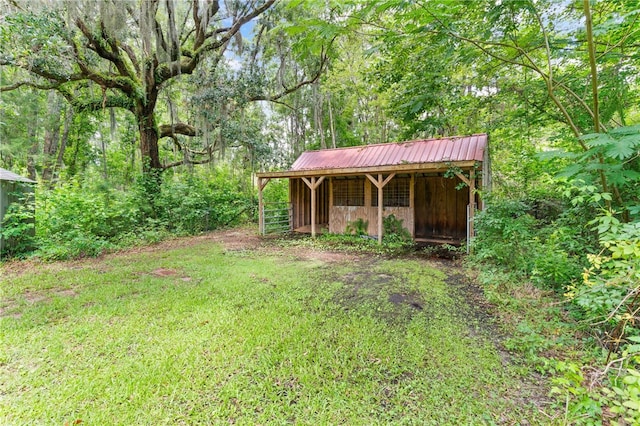 4936 US Highway 17 N, Brunswick, GA 31525 - view of yard featuring an outdoor structure, a view of trees, and a pole building