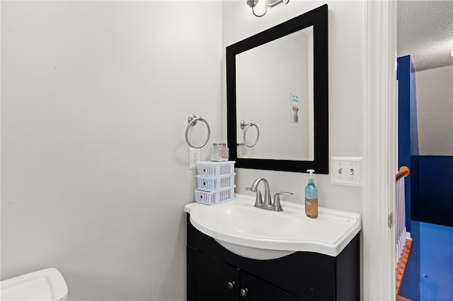 4936 US Highway 17 N, Brunswick, GA 31525 - bathroom with vanity and a textured ceiling