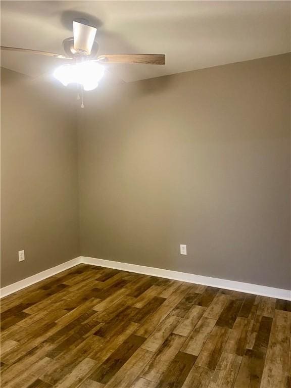 4726 New Jesup Hwy, Brunswick, GA 31520 - empty room with dark wood-style floors, baseboards, and ceiling fan