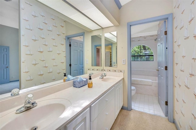 40 W Lake Dr, Saint Simons Island, GA 31522 - full bath with double vanity, toilet, and a bath