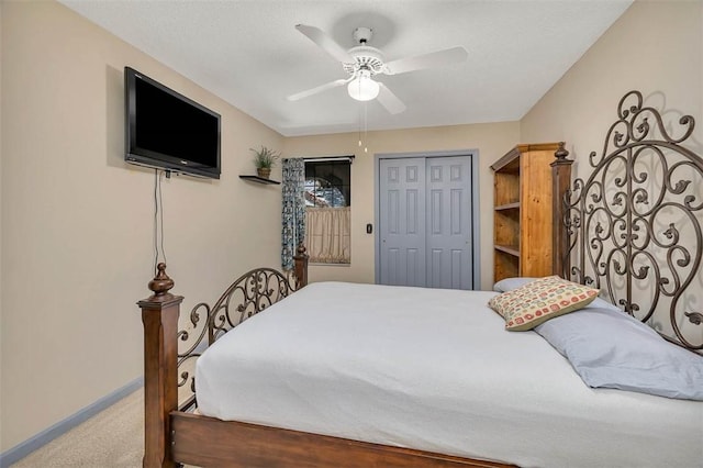 40 W Lake Dr, Saint Simons Island, GA 31522 - carpeted bedroom featuring a closet, baseboards, and a ceiling fan