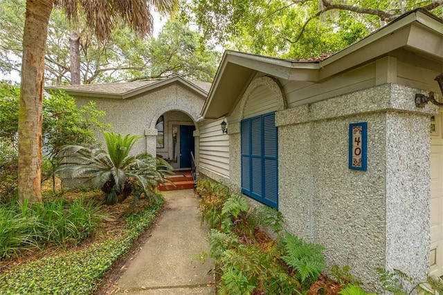 40 W Lake Dr, Saint Simons Island, GA 31522 - property entrance featuring stucco siding