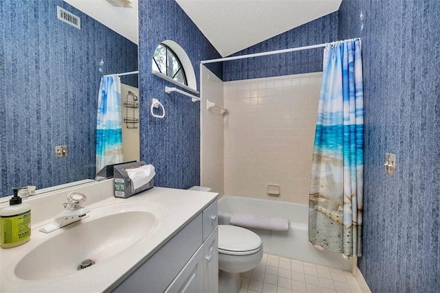 40 W Lake Dr, Saint Simons Island, GA 31522 - bathroom with tile patterned flooring, lofted ceiling, toilet, shower / tub combo with curtain, and vanity