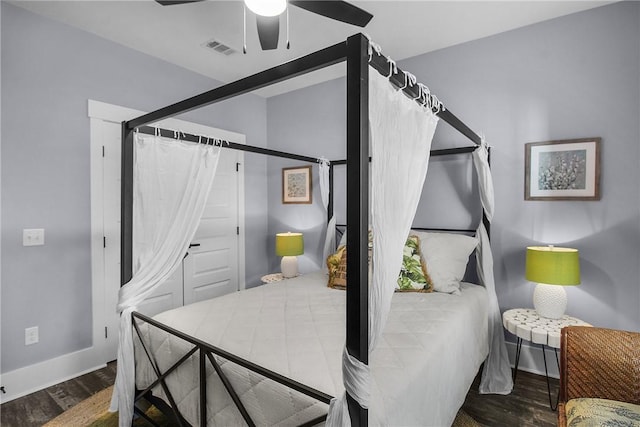 bedroom with hardwood / wood-style flooring and ceiling fan