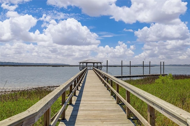 dock area featuring a gazebo and a water view